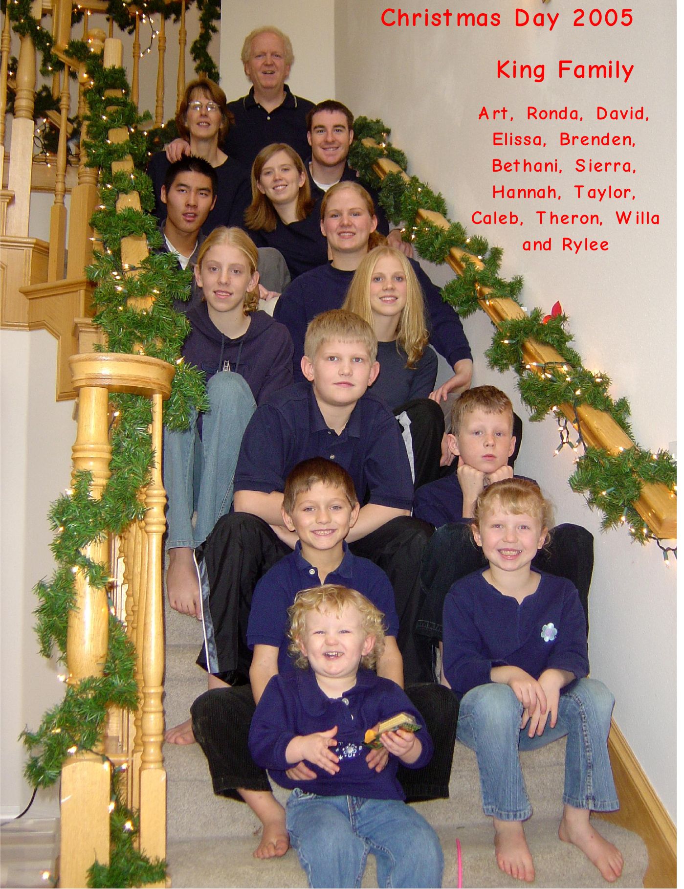 Photo from the 2005 Christmas letter: King family on a staircase decorated with garland, Christmas Day 2005